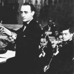 Young Juan D'Arienzo directing his orchestra